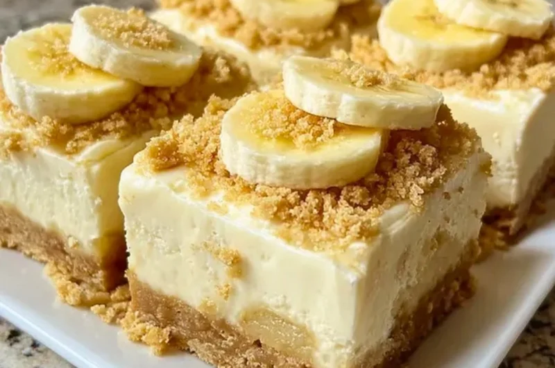 Delicious banana pudding cheesecake squares served in a dessert dish