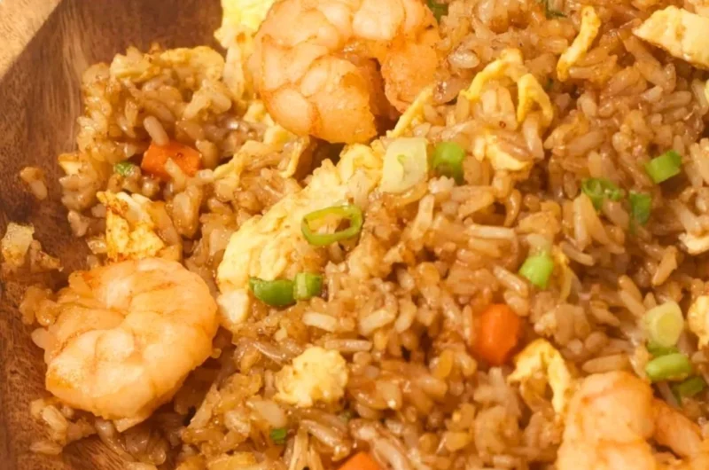 Bowl of homemade Chinese shrimp fried rice with vegetables