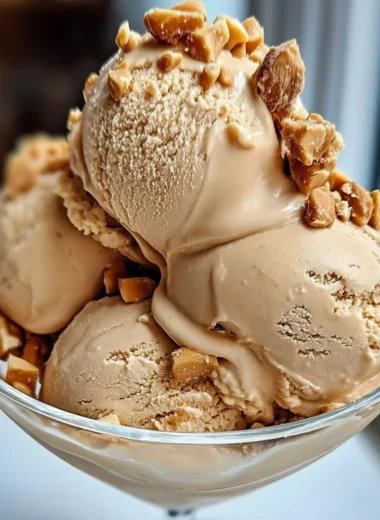 Delicious Peanut Butter Greek Yogurt frozen yogurt in a bowl with toppings