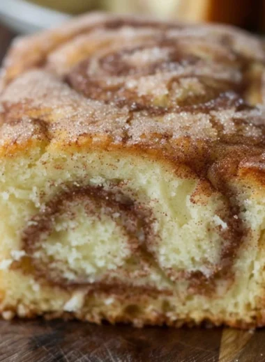Cinnamon swirl donut bread with a sweet, swirled cinnamon filling