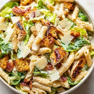Cozy Chicken Caesar Pasta Salad with fresh ingredients in a bowl