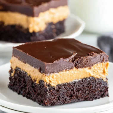Delicious layered peanut butter brownies topped with chocolate ganache