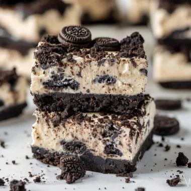 Delicious Oreo cheesecake bars served on a plate