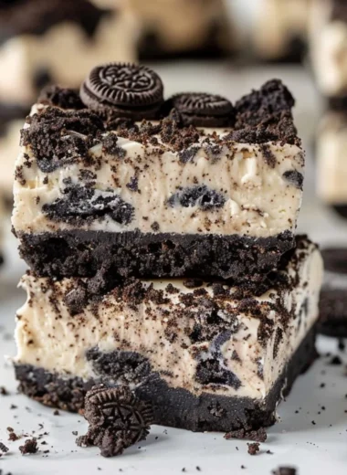 Delicious Oreo cheesecake bars served on a plate