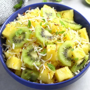 Freshly prepared Pineapple Kiwi Salad with vibrant tropical fruits