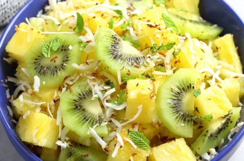 Freshly prepared Pineapple Kiwi Salad with vibrant tropical fruits
