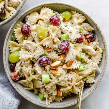 Delicious Poppyseed Chicken Pasta Salad served in a bowl with fresh ingredients