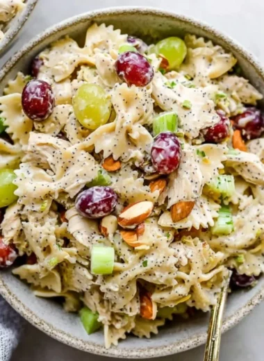 Delicious Poppyseed Chicken Pasta Salad served in a bowl with fresh ingredients