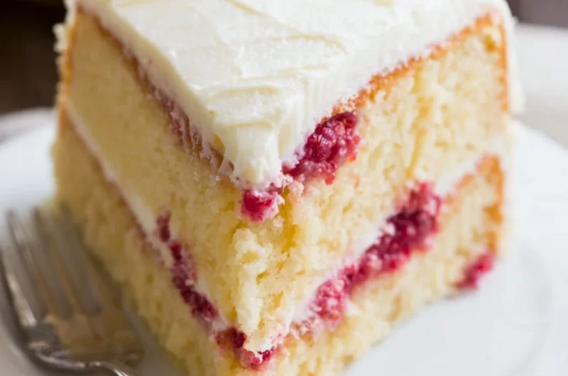 Delicious Raspberry Lemon Cake with fresh raspberries and lemon zest