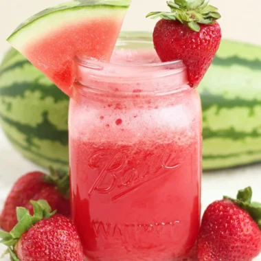 Refreshing glass of strawberry watermelon cucumber juice with fresh ingredients