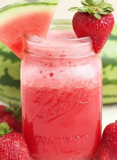 Refreshing glass of strawberry watermelon cucumber juice with fresh ingredients