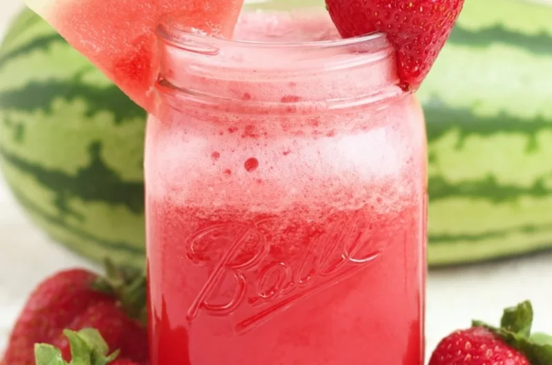 Refreshing glass of strawberry watermelon cucumber juice with fresh ingredients