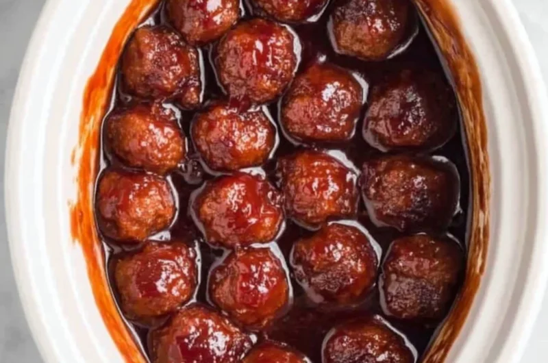 Crockpot BBQ grape jelly meatballs served on a platter