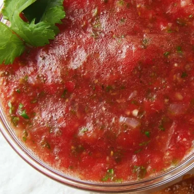 Bowl of easy homemade salsa with fresh ingredients and vibrant colors.