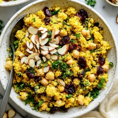 Vibrant Moroccan-Inspired Chickpea Quinoa Salad with fresh vegetables and herbs.