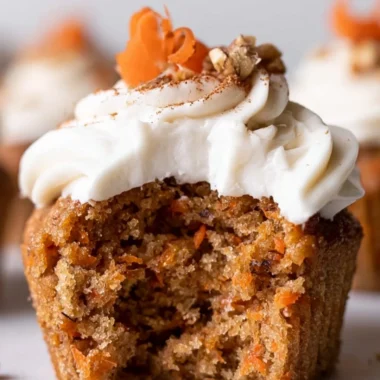 Delicious cozy carrot cake cupcakes decorated with cream cheese frosting