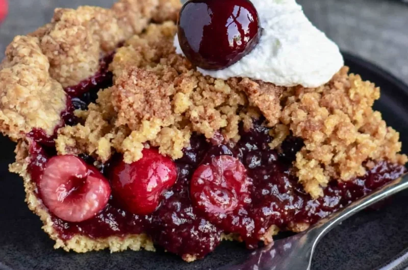 Cozy cherry crumb pie with a buttery crumb topping and vibrant cherries