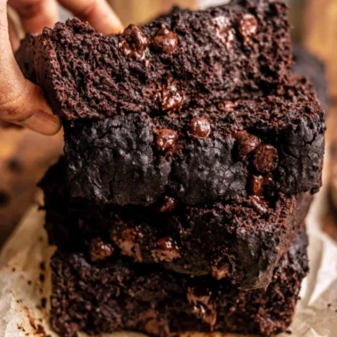 Cozy chocolate pumpkin bread sliced on a wooden table