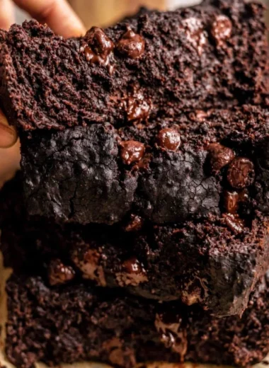 Cozy chocolate pumpkin bread sliced on a wooden table