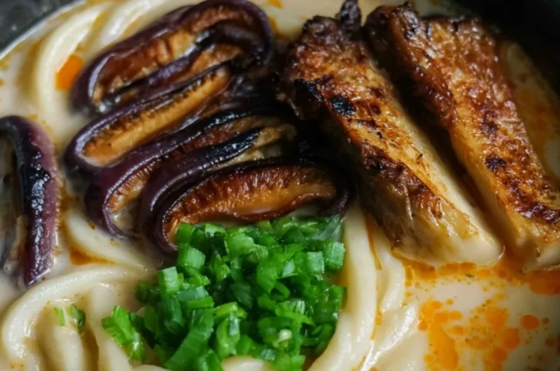 Cozy miso udon soup with teriyaki mushrooms in a bowl