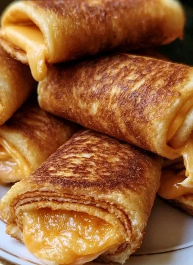 Delicious crispy cheesy roll ups served as a tasty snack or appetizer