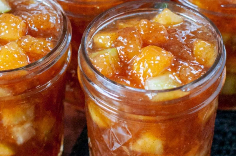 Jars of preserved apples for fall apple preserving recipes.