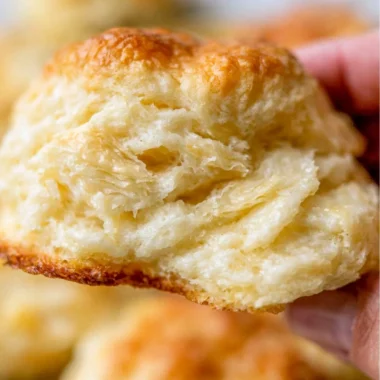 Fluffy homemade biscuits straight from the oven, golden and delicious.