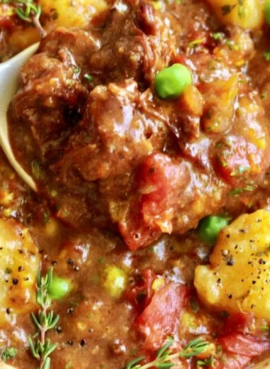 Hearty vegan gnocchi stew with fresh vegetables in a bowl