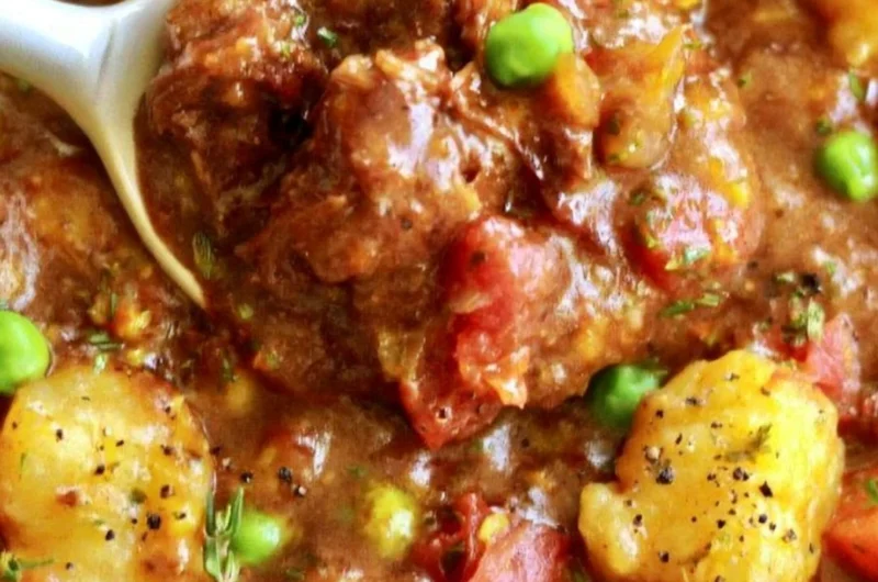 Hearty vegan gnocchi stew with fresh vegetables in a bowl