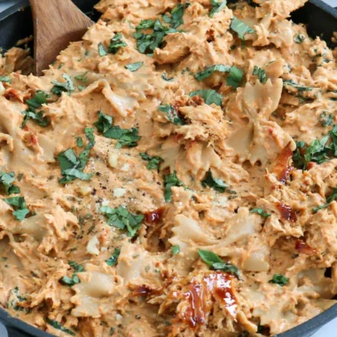 Delicious Marry Me Chicken Pasta served with fresh herbs and cheese.
