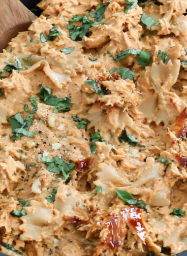 Delicious Marry Me Chicken Pasta served with fresh herbs and cheese.