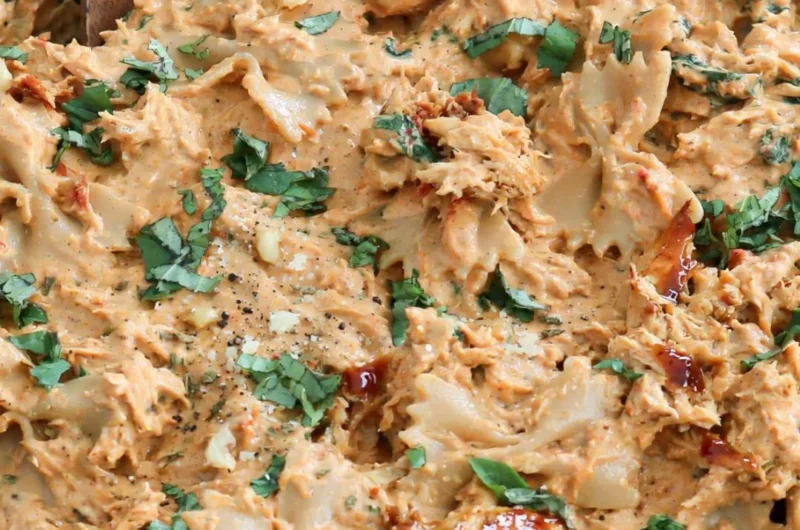 Delicious Marry Me Chicken Pasta served with fresh herbs and cheese.