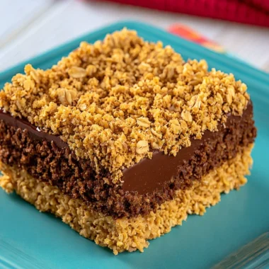No-bake chocolate peanut butter oat bars stacked for a tasty snack.